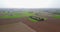 Nature and landscape: Aerial view of fields, trees and plowed fields, cultivation, green grass, dirt road