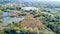 Nature and landscape: Aerial view of a forest and lakes, green and trees in a wild landscape.