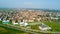 Nature and landscape, municipality of Solaro, Milano: Aerial view of a field, houses and homes, Italy