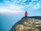 Nature misty show. Guy standing on top of the mountain