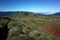 Nature of Patagonia, Hills covered with grass, smal ravine on mountainside of volcano Puyehue in Puyehue National Park