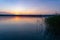 Nature and reed reflection on the Lake Balaton in Hungary at sunset