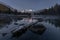 Nature Of Russia. Blue Hour On The Lower Multinsky Lake Near The Spurs Of Katun Ridge. Fallen Frostbitten Tree And Reflecting Whit