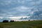 Nature's Fury: Storm Clouds Over Farm Fields