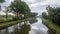 Nature's Serenity: Canal Amidst Verdant Forest