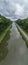 Nature's Serenity: Canal Amidst Verdant Forest