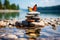 Nature\\\'s serenity, stacked pebbles, butterfly, colorful summer sky, tranquil beach