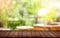 Nature\\\'s Showcase: Empty Wood Table with Blurred Garden Background