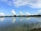 Nature scenery  is very beautiful in our village. Blue sky ,white clouds reflected in Lake water.