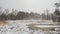 Nature studies path leading through carbon dioxide storing moor and peatland in Bavaria in winter with snow-covered landscape and