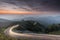 Nature sunrise background amazing curve road and twilight color long exposure view. Popular travel Mountain in Thailand