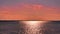 Nature sunset background Romantic beautiful sunset afternoon at sea on horizon Baltic Sea boat coral seashell on the rock sea sky