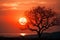 Natures abstract art Small sun, tree silhouette, tranquil sunset beauty