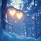 Natures embrace Two hearts on a branch in a snowy forest