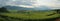 Natures masterpiece: panoramic view of corn fields during the rainy season