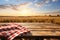 Natures stage Wooden table, sunlit wheat field, ready for product montages