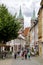 Naumburg, Germany - August, 06, 2019; tourists on a pedestrian street leading to the cathedral