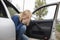 Nausea during a car trip. A blonde woman suffers from kinetosis. The concept of motion sickness in diseases of the transport and