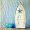 Nautical boat shape shelves and nautical life style objects on wooden table. vintage filtered