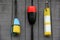 Nautical buoys on gray wall