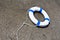 Nautical lifebuoy, lifebelt, life saver in clear water