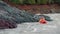 Nautical rescue team try to reach a victim stuck on an island.