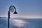 Nautilus Lamp In The Morning Calm At Lyme Regis