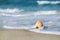 Nautilus shell with sea wave, Florida beach under the sun ligh