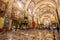 Nave and tombstones with altar in background in Valletta Cathedral, Malta