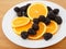 Navel orange and fresh blackberries