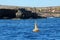 Navigation buoy in the sea near Comino Island, Malta.