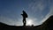 Navigation travel silhouette concept. Man hiker traveler checking smartphone sunshine sunset the gps navigator hiking in