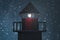 Navigational marine lighthouse at night. Starry bokeh in background