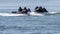 Navy military special force team in action with guns and black diver suites