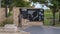 Navy sailor statue and Korean War wall in the Veteran`s Memorial Park in the City of Irving, Texas.