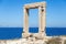 Naxos Portara, Temple of Apollo, Cyclades island, Greece. Sunny day, calm sea, blue sky background