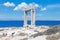 Naxos Portara, Temple of Apollo, Cyclades island, Greece. Sunny day, calm sea, blue sky background