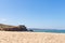 Nazare, Portugal - June 29, 2021: View of the fortification and lighthouse of Nazare from the North Beach