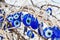 Nazars, Turkish Evil eye charms on the tree. Goreme. Cappadocia. Turkey