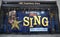 NBC Experience Store window display decorated with Sing film promotion by Illumination Entertainment in Rockefeller Center