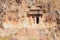 Ðncient Lycian tomb which is cut down in rock. Fethiye, Turkey