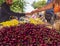 Nea Artaki, Evia island, Greece. July 2019: Greek village market on the island of Evia with cherry, fruits and vegetables on a Sun