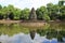 Neak pean in Cambodia and reflection, tower reflection