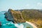 Near Atuh beach, Nusa Penida island, Bali, Indonesia. Ocean waves, cliffs, tropical plants