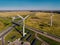 Near huge wind stations background blue sky and top