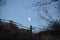 Nearly full moon over a broken fence