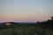 A Nearly Full Moon Over the Ochre Cliffs of Roussillon France