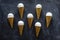 Neat arrangement of seven ice cream cones