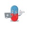 A neat cartoon character of pills drug l working at home during pandemic