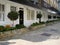 a neat and elegant London row of mews cottages